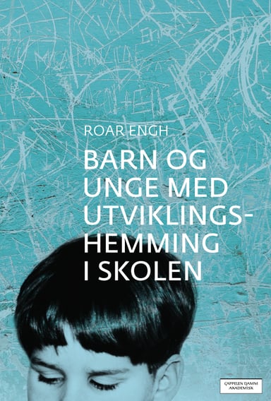 Omslag av "Barn og unge med utviklingshemming i skolen"